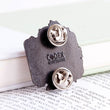 Laden Sie das Bild in den Galerie-Viewer, First aid kit enamel pin, view from behind
