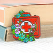 Laden Sie das Bild in den Galerie-Viewer, First aid kit enamel pin for nurses, doctors and emergency healthcare workers